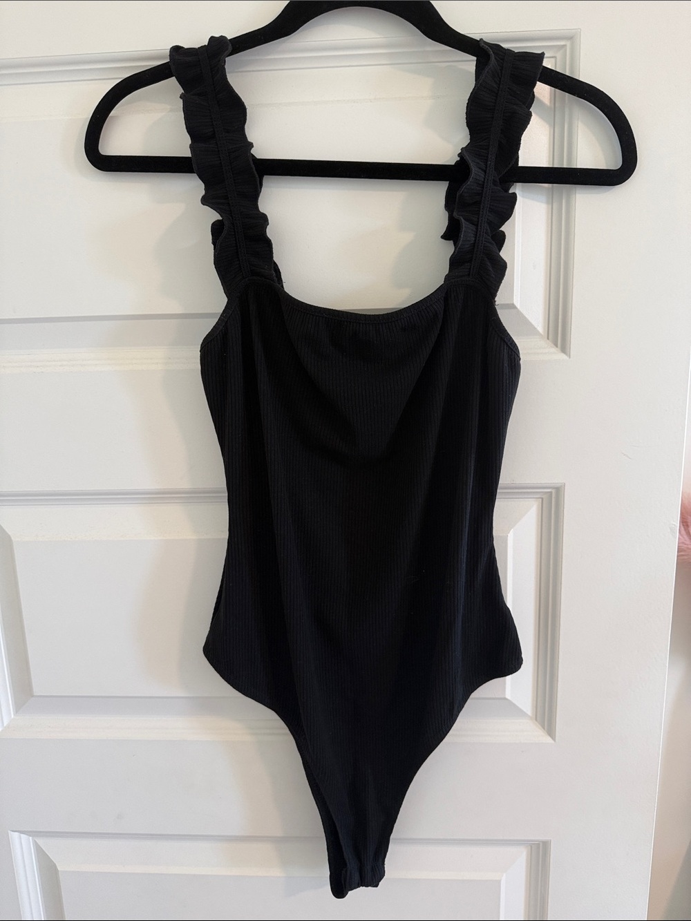 Kittenish Black Ruffle Strap Bodysuit